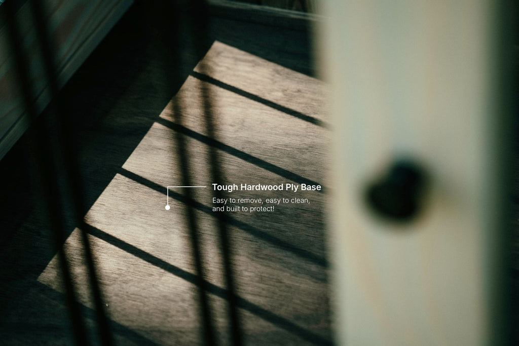 Close-up of tough hardwood ply base inside a single wooden dog crate, showing the easy-to-clean, removable floor of the handmade wooden crate.